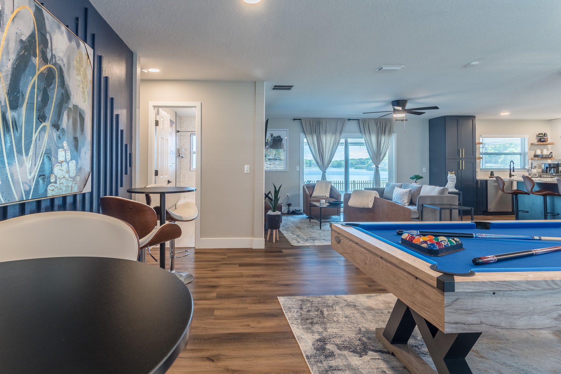 Open concept living area with pool table